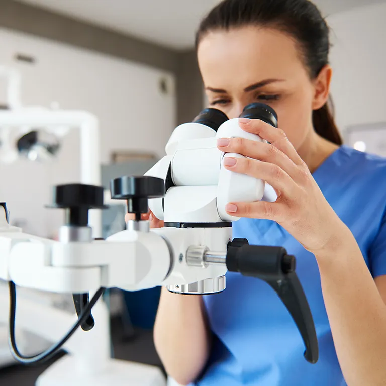 Image of a dentist testing with equipment