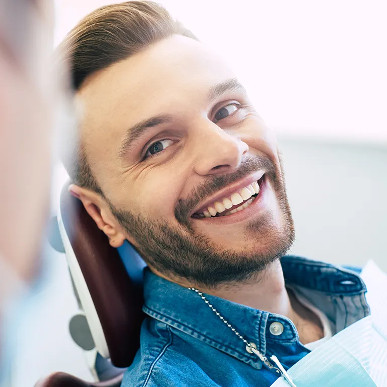 Image of a man in a dentist chair